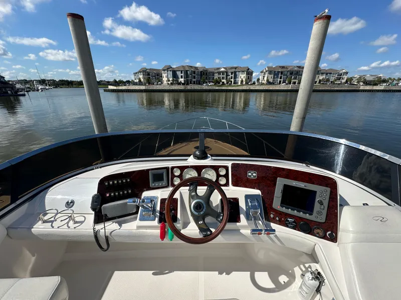 Slide: The Image of 2007 Regal 4080 Flybridge Sedan with luxurious leather seating. - 23