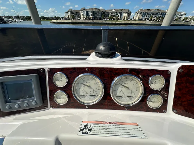 Slide: The Image of 2007 Regal 4080 Flybridge Sedan with luxurious seating on the water. - 24