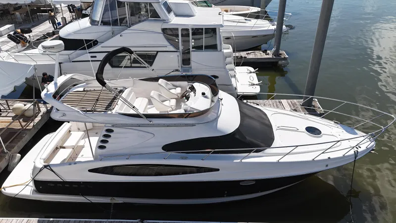 Slide: The Image of 2007 Regal 4080 Flybridge Sedan on calm waters. - 3