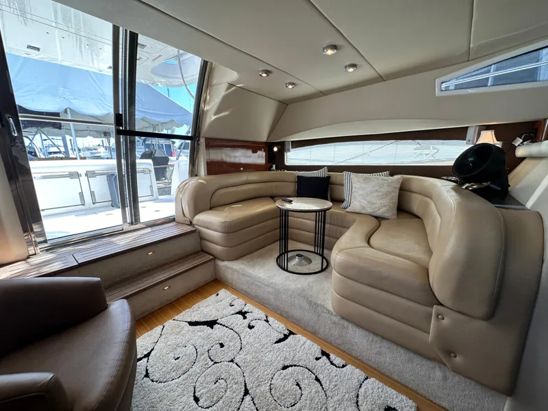 Slide: The Image of Luxurious interior of 2007 Regal 4080 Flybridge Sedan with plush seating and modern decor. - 34