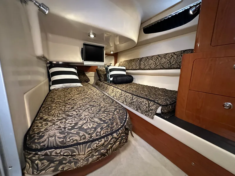 Slide: The Image of Luxurious interior of 2007 Regal 4080 Flybridge Sedan with modern kitchen amenities. - 42
