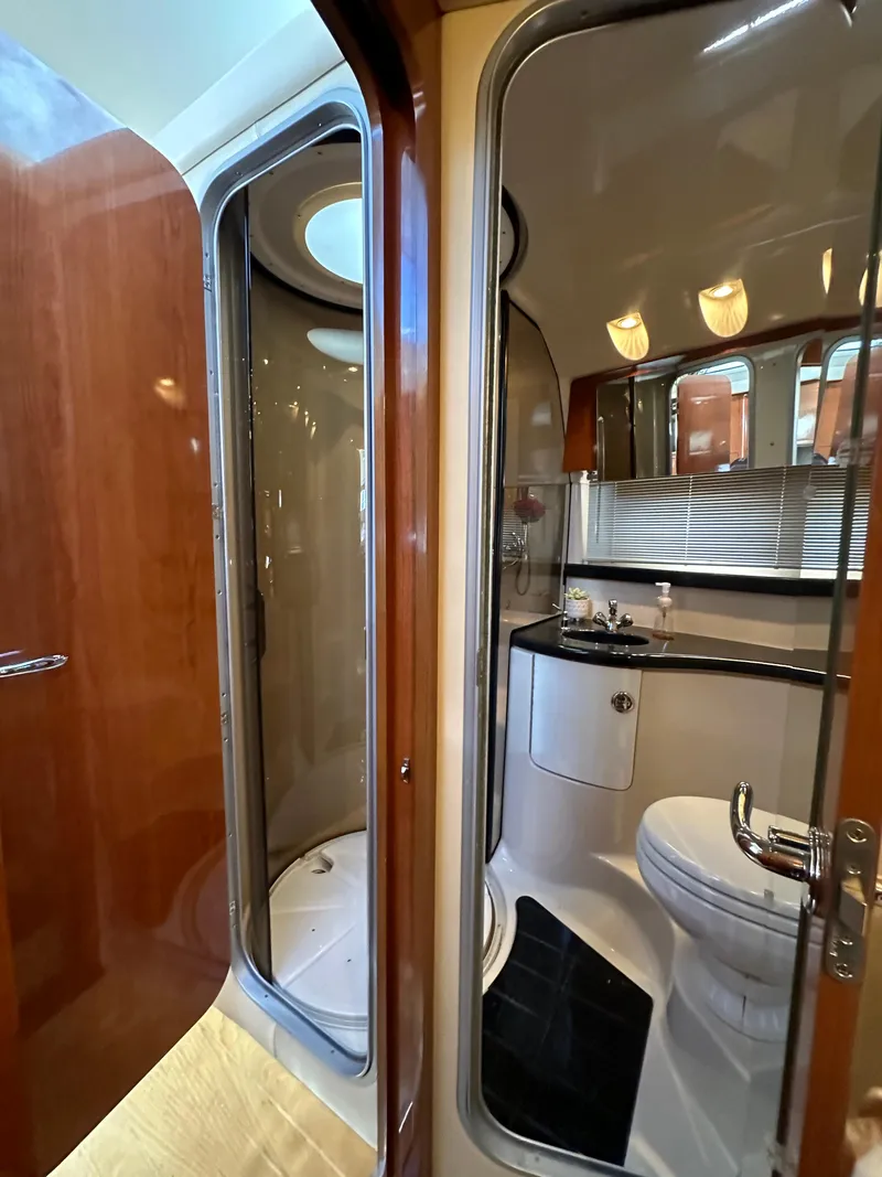 Slide: The Image of Luxurious bathroom in 2007 Regal 4080 Flybridge Sedan yacht with modern shower. - 54