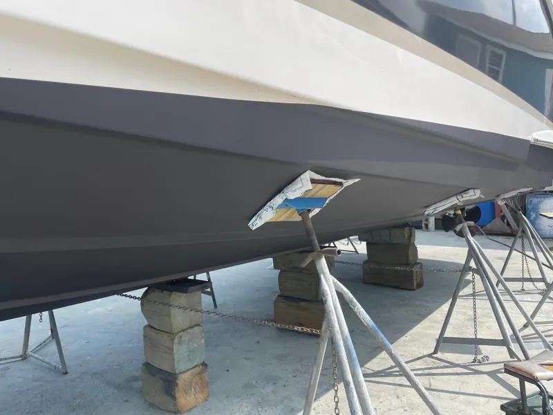 Slide: The Image of Regal 4080 Flybridge Sedan 2007 elevated for maintenance. - 67