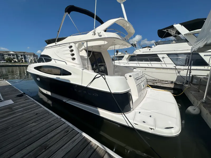 Slide: The Image of 2007 Regal 4080 Flybridge Sedan on calm waters. - 7