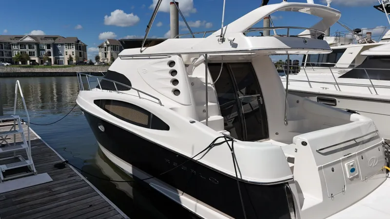 Slide: The Image of 2007 Regal 4080 Flybridge Sedan on water, aerial view. - 8