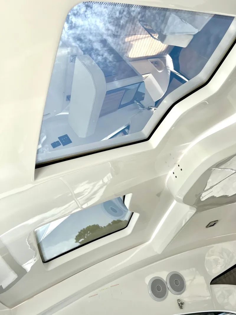 Slide: The Image of 2024 Sessa Marine C36 IB yacht interior with skylight view. - 12