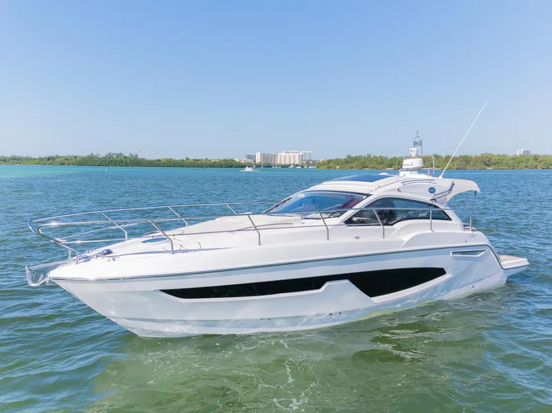 Slide: The Image of 2024 Sessa Marine C36 IB yacht cruising on a sunny day. - 3