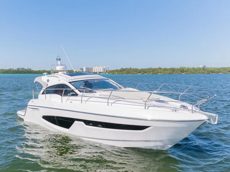 Slide: The Image of 2024 Sessa Marine C36 IB yacht cruising on a sunny day. - 4