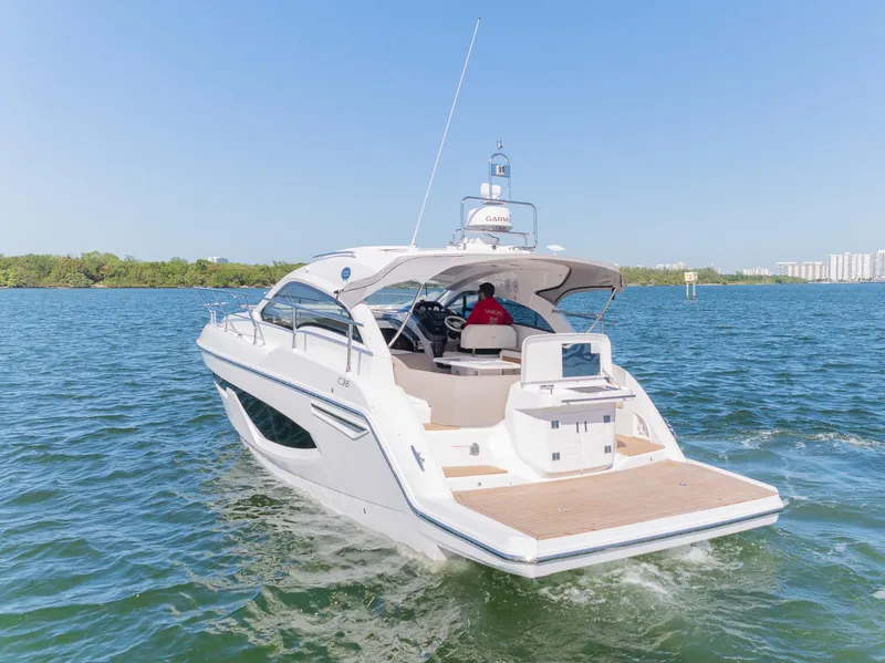 Slide: The Image of 2024 Sessa Marine C36 IB yacht cruising on open water. - 5