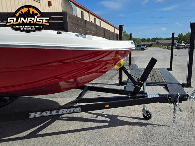 Slide: The Image of 2023 Stingray 192 SC boat on Haul Rite trailer at Sunrise Marine. - 11
