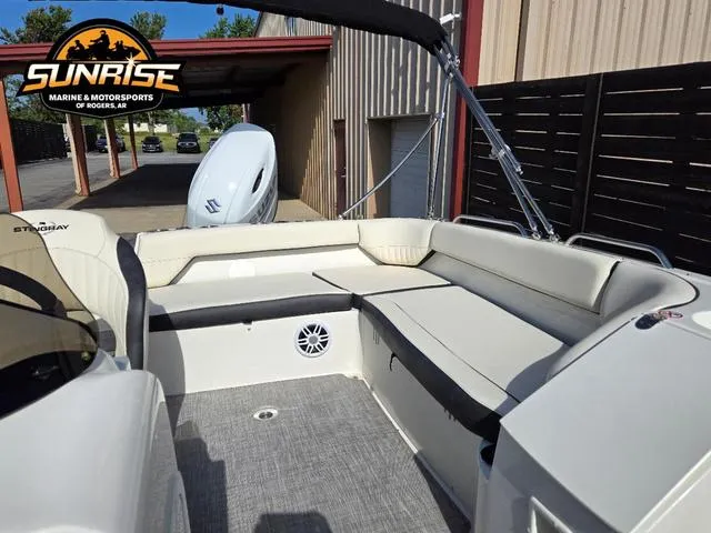 Slide: The Image of 2023 Stingray 192 SC boat interior with seating, showcased at Sunrise Marine & Motorsports. - 16