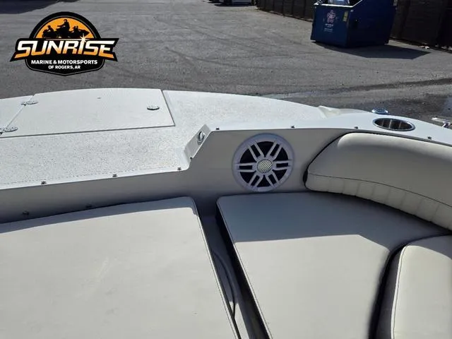 Slide: The Image of 2023 Stingray 192 SC boat interior with speaker and seating, Sunrise Marine logo visible. - 17