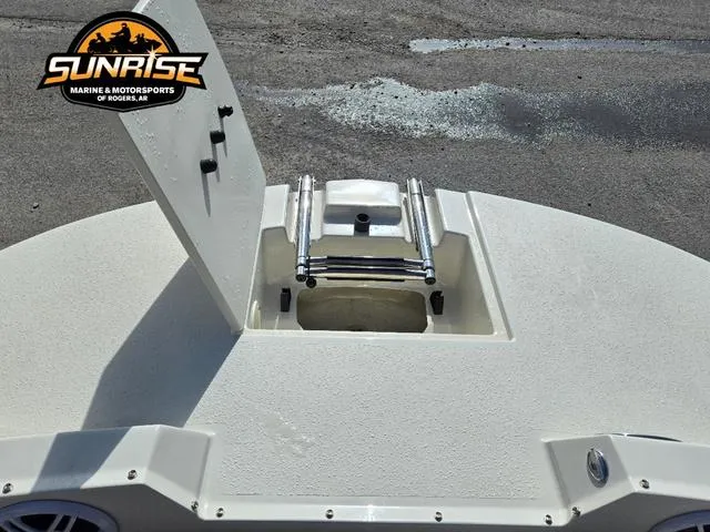 Slide: The Image of 2023 Stingray 192 SC boat deck with ladder, Sunrise Marine logo visible. - 20