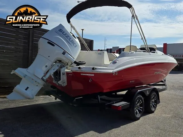Slide: The Image of 2023 Stingray 192 SC boat with Suzuki engine on trailer at Sunrise Marine. - 25