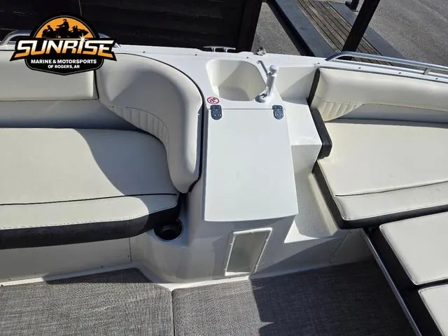 Slide: The Image of 2023 Stingray 192 SC boat interior with seating and sink, Sunrise Marine logo visible. - 7