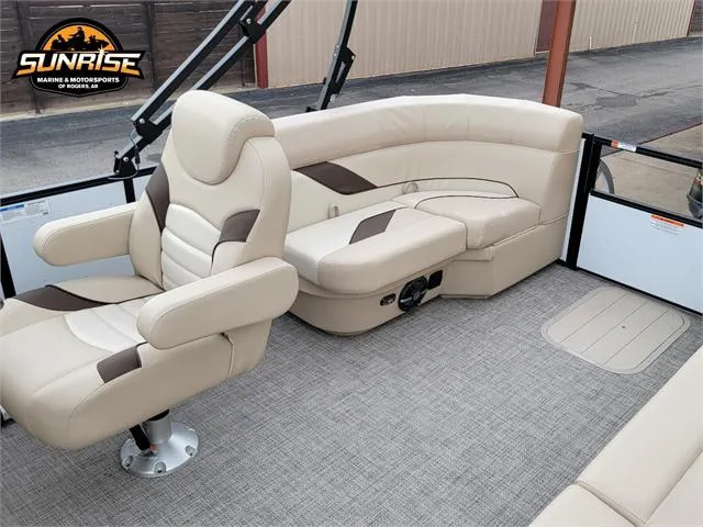 Slide: The Image of 2024 SunCatcher Select 320RCX boat interior with beige seating and carpeted flooring. - 13