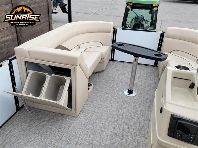 Slide: The Image of 2024 SunCatcher Select 320RCX pontoon boat interior with seating and table. - 15