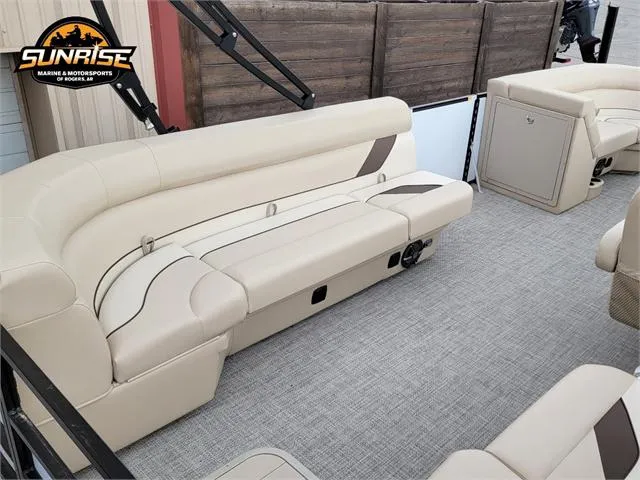 Slide: The Image of 2024 SunCatcher Select 320RCX boat interior with beige seating and carpeted flooring. - 4