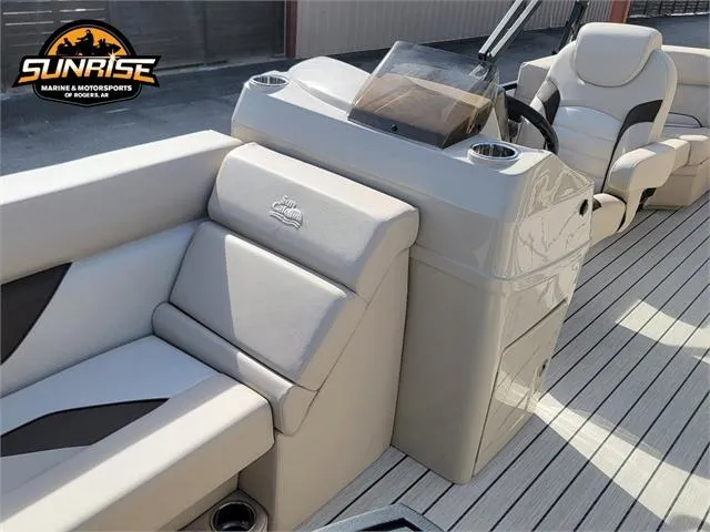 Slide: The Image of 2024 SunCatcher Select 20RC boat interior with plush seating and modern console. - 13