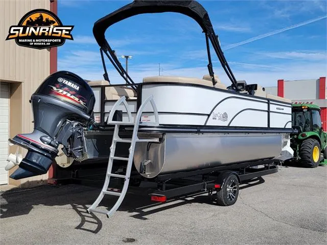Slide: The Image of 2024 SunCatcher Select 20RC pontoon boat with Yamaha motor on trailer. - 2