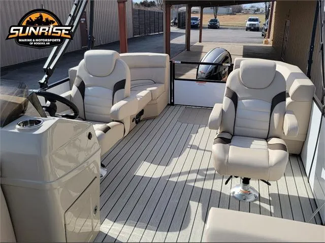Slide: The Image of 2024 SunCatcher Select 20RC boat interior with plush seating and modern design. - 20