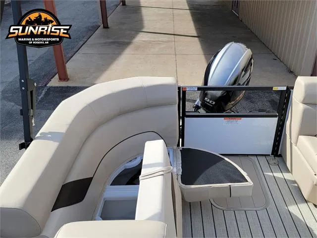Slide: The Image of 2024 SunCatcher Select 20RC boat interior with seating and outboard motor. - 25