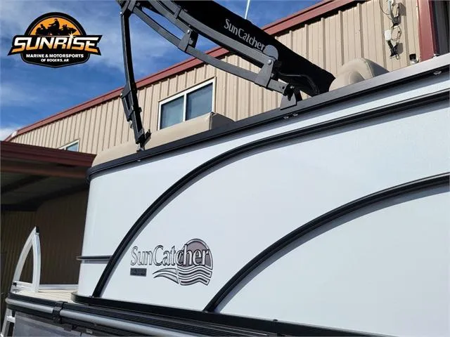 Slide: The Image of 2024 SunCatcher Select 20RC boat exterior with logo, displayed at Sunrise Marine & Motorsports. - 5