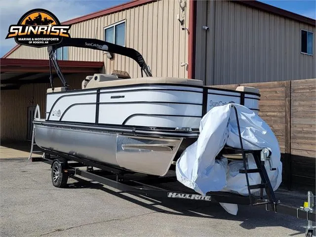 Slide: The Image of 2024 SunCatcher Select 20RC pontoon boat on trailer at Sunrise Marine dealership. - 7
