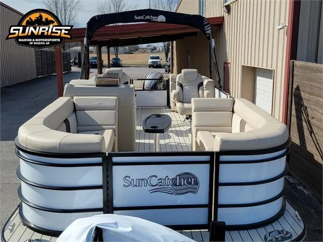 Slide: The Image of 2024 SunCatcher Select 20RC pontoon boat with beige seating and canopy, displayed at Sunrise Marine. - 9