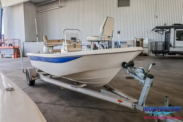 Slide: The Image of 2020 Carolina Skiff 178 boat on trailer in indoor storage facility. - 1