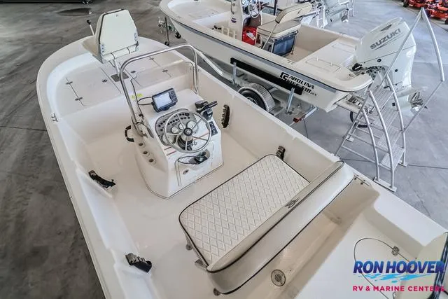 Slide: The Image of 2020 Carolina Skiff 178 boat interior with steering console and seating at Ron Hoover RV & Marine Center. - 13