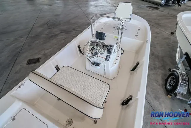 Slide: The Image of 2020 Carolina Skiff 178 boat interior with steering console and seating, displayed at Ron Hoover RV & Marine Centers. - 14