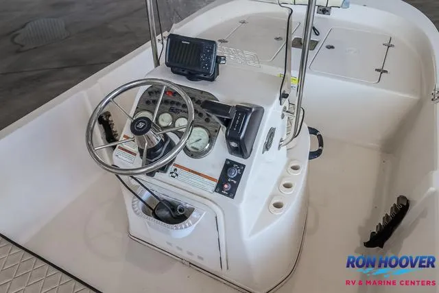 Slide: The Image of 2020 Carolina Skiff 178 boat console with steering wheel and gauges. - 16
