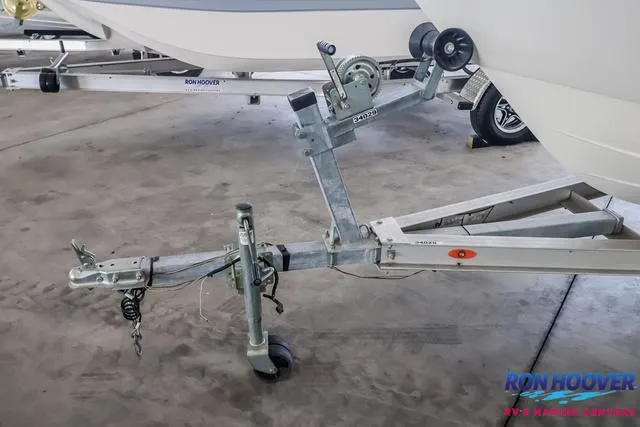 Slide: The Image of 2020 Carolina Skiff 178 boat trailer with winch in a showroom. - 25