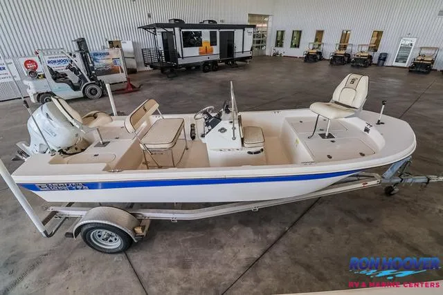 Slide: The Image of 2020 Carolina Skiff 178 boat on trailer in showroom. - 8