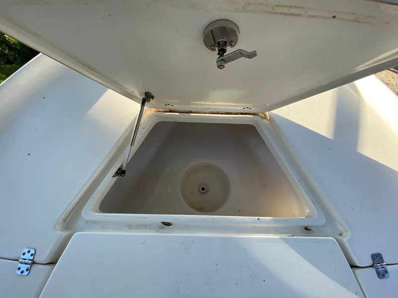 Slide: The Image of Open storage compartment on 2017 Key West 230 Bay Reef boat. - 18
