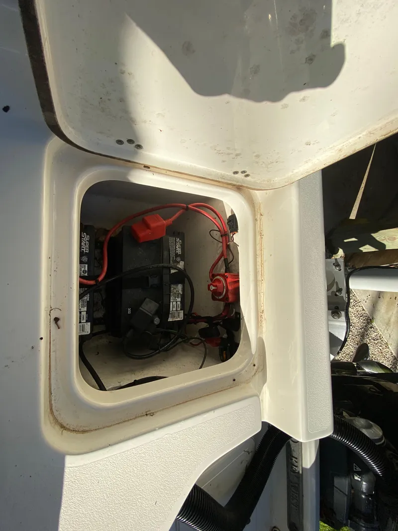 Slide: The Image of 2017 Key West 230 Bay Reef boat battery compartment with wiring. - 36