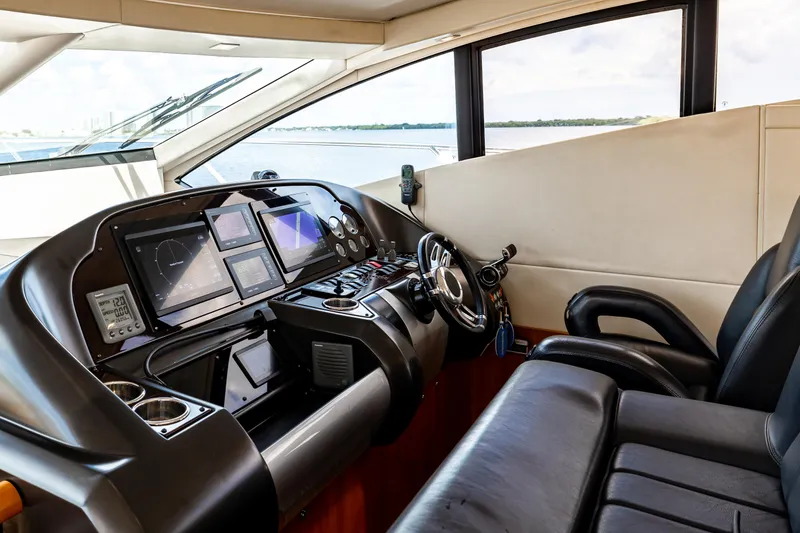 Slide: The Image of Interior helm of 2010 Sunseeker Predator 64 yacht with modern navigation equipment. - 31