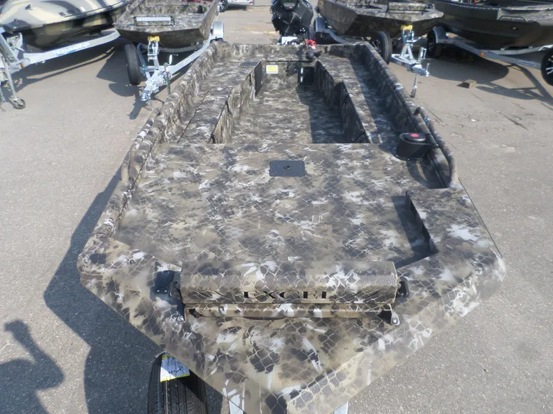 Slide: The Image of 2025 Excel 1854 SWV4 boat with camouflage design on a trailer. - 2