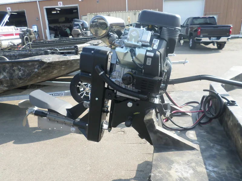 Slide: The Image of 2025 Excel 1854 SWV4 boat engine in a workshop setting. - 4