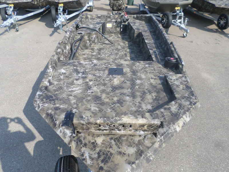 Slide: The Image of 2025 Excel 1860 SWV4 boat with camouflage design on a trailer. - 3