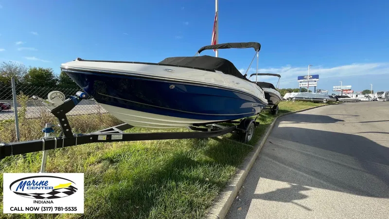 Slide: The Image of 2024 Bayliner VR5 boat on trailer at Marine Center Indiana dealership. - 7