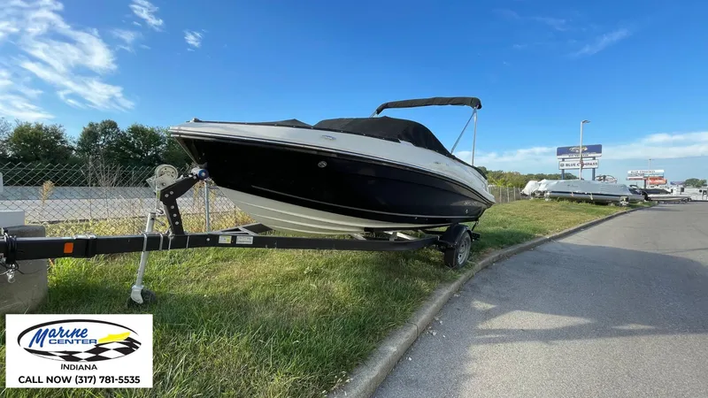 Slide: The Image of 2024 Bayliner VR5 boat on trailer at Marine Center Indiana dealership. - 18