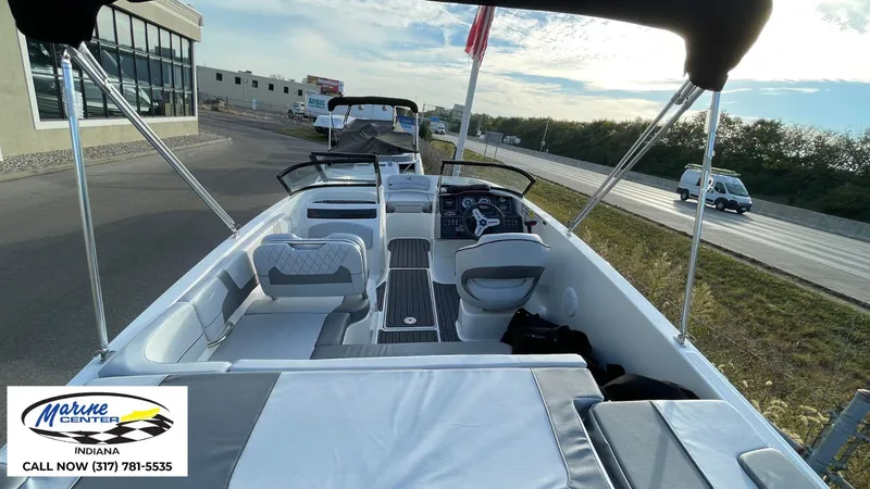 Slide: The Image of 2024 Bayliner VR5 boat interior at Marine Center Indiana dealership. - 6