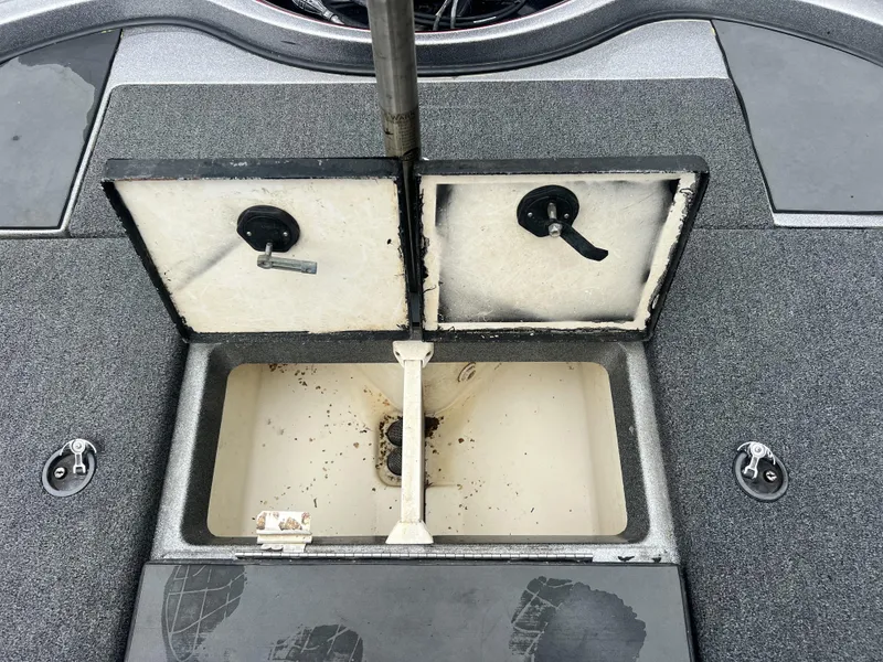 Slide: The Image of Open storage compartment on 2009 Ranger 208 VX boat deck. - 25