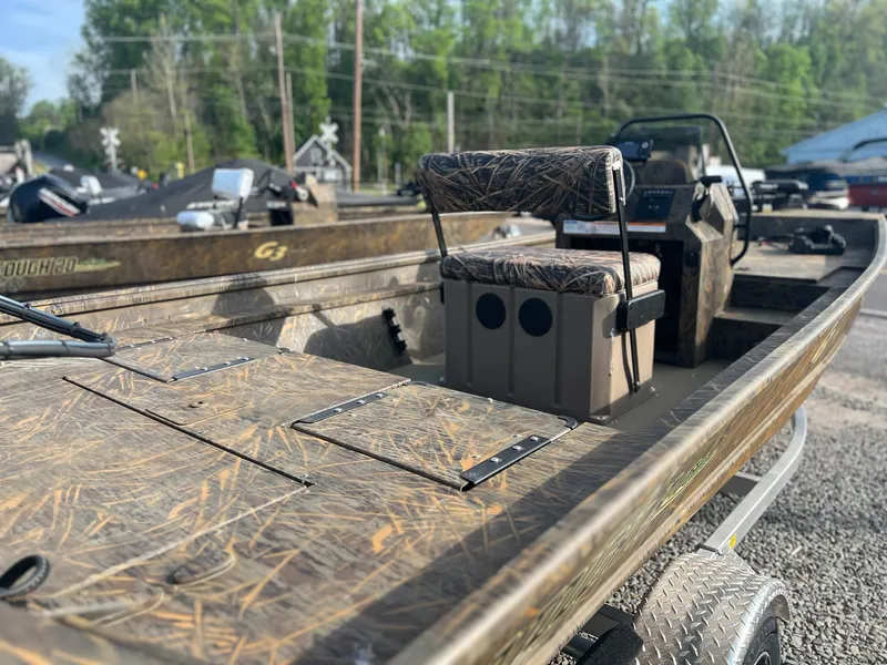 Slide: The Image of 2025 G3 Gator Tough 18 CCJ boat with camo seats and rugged design. - 19