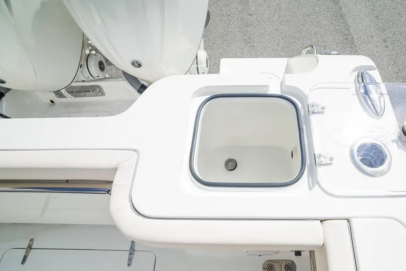 Slide: The Image of 2025 Sea Hunt Gamefish 28 FS boat deck with livewell and seating. - 27