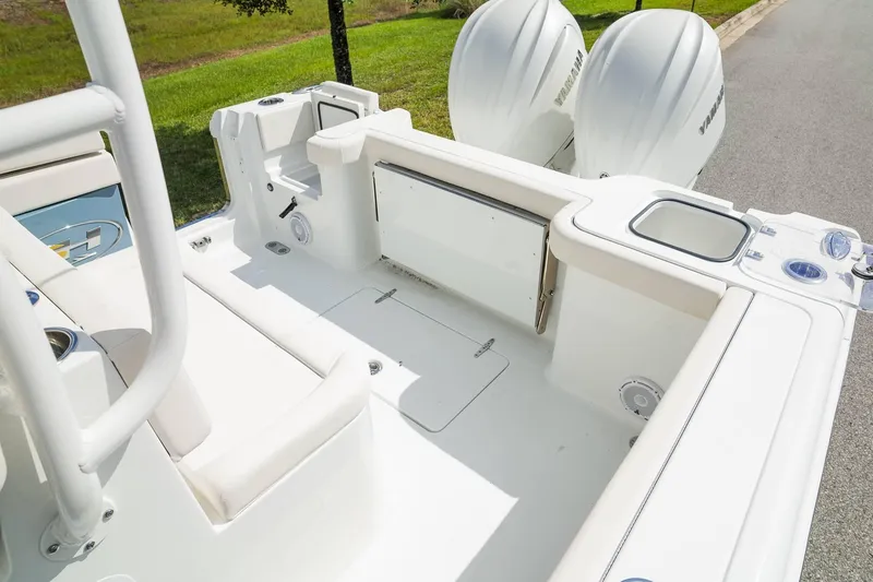 Slide: The Image of 2025 Sea Hunt Gamefish 28 FS boat interior with dual Yamaha engines. - 28