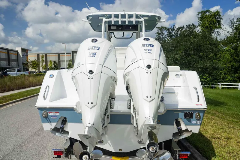 Slide: The Image of 2025 Sea Hunt Gamefish 28 FS with dual 300 V6 engines, rear view. - 31
