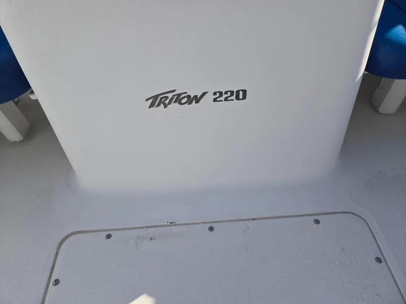 Slide: The Image of 2008 Sea Hunt Triton 220 boat interior with logo. - 8